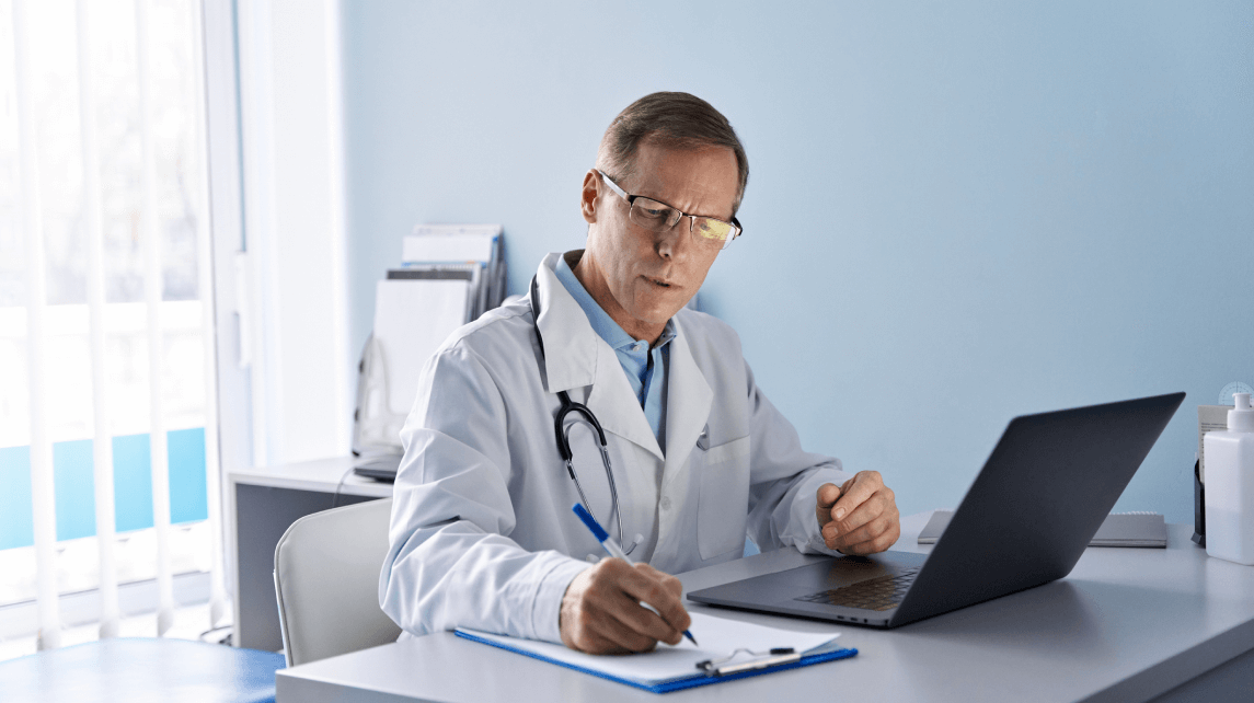 Physician at a desk - HealthStream