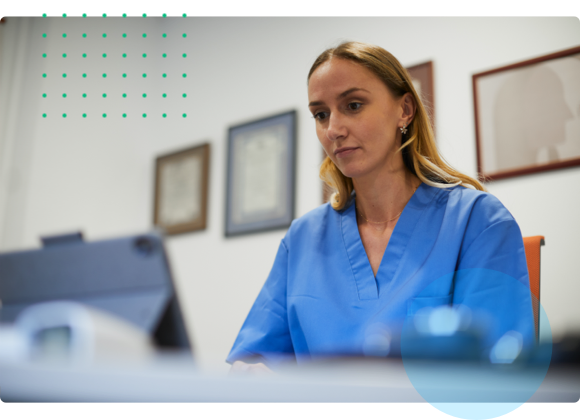 Clinical Documentation Woman at Computer or Tablet